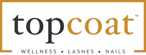Logo for Topcoat, a company offering wellness, lash, and nail services. The word "topcoat" is stylized in black and gold text within a rectangular border.